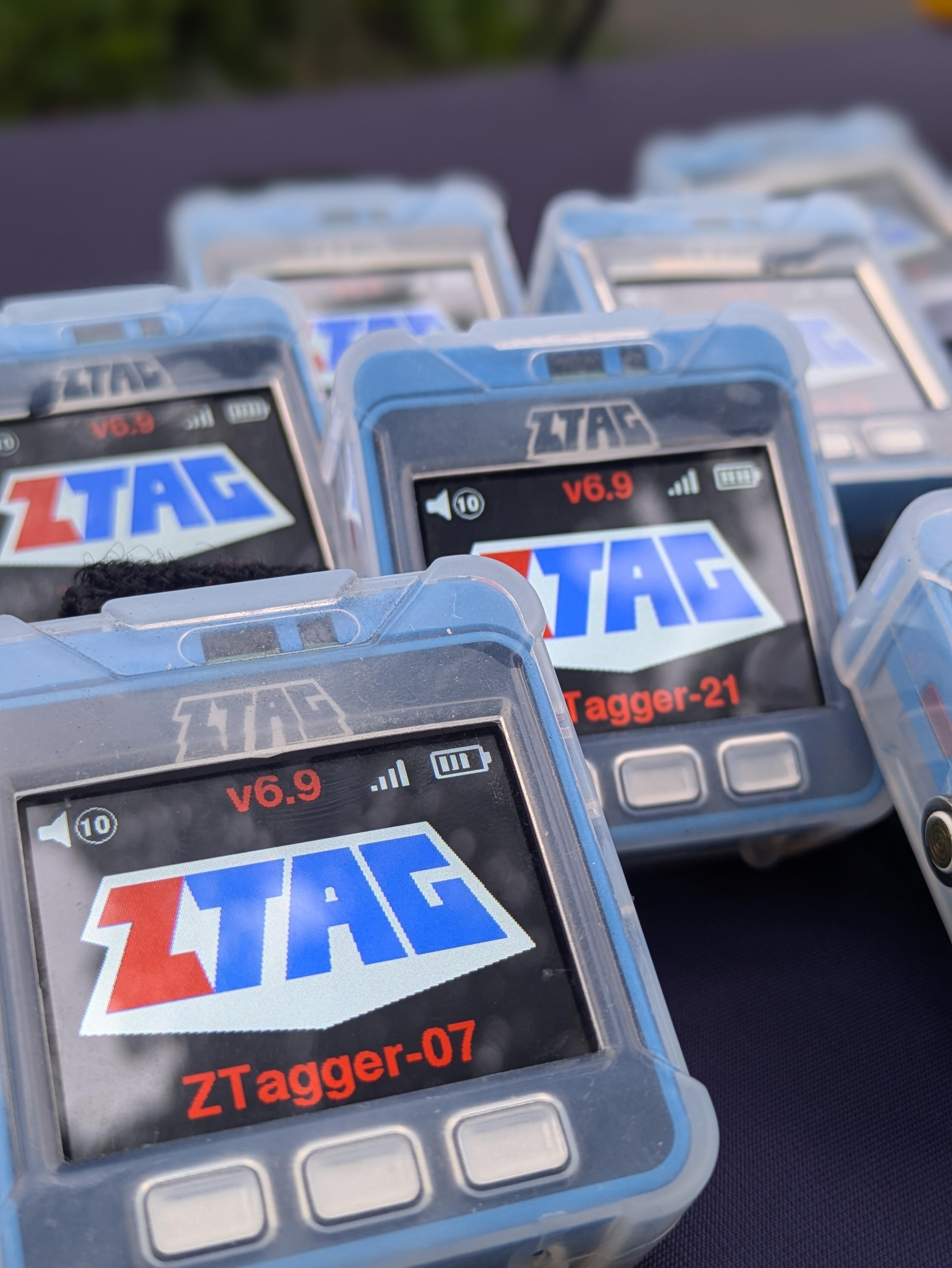 ZTAG devices laid out on a tablecloth.